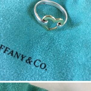used Tiffany & Co gold/silver heart ring will ship with bag and in Tiffany box